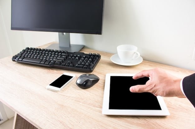 The Xiaomi tablet connected to a monitor, keyboard, and mouse, showcasing its ability to function as a desktop replacement. The screen displays a split-screen view with multiple applications running simultaneously.